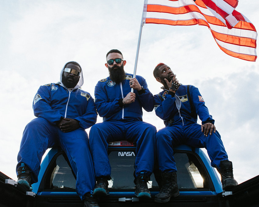 Christopher "Topher" Townsend poses with his fellow members of the "Space Force" group. Pictured, from left: Topher, D. Cure, and The Marine Rapper. 